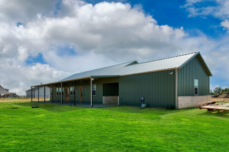 Vibrant Green Godley Texas Barndominium by HL Custom Homes