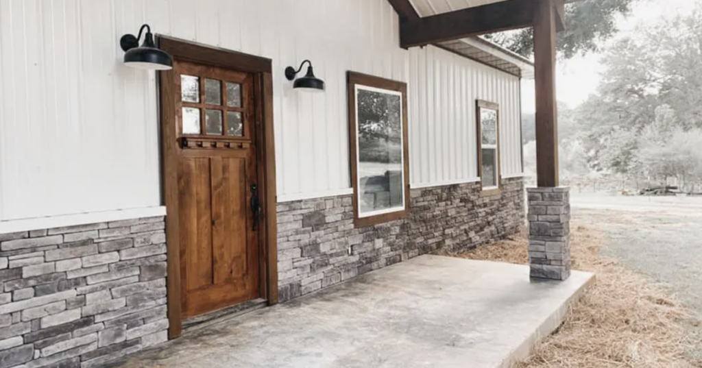 barndominium with stone accent