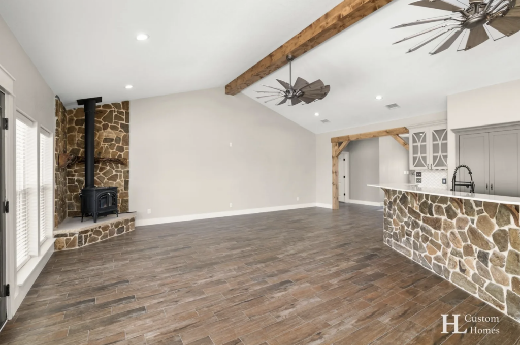 barndominium with stone accent