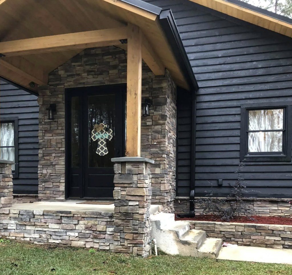 barndominium with stone accent