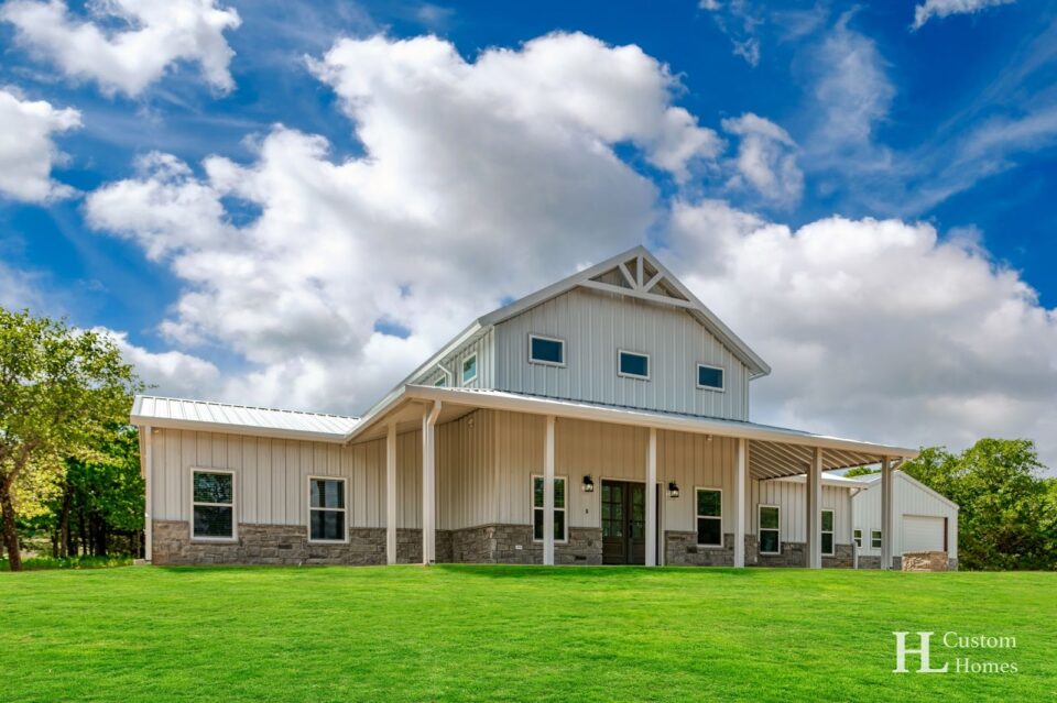 White 2-Story Barndominium by HL Custom Homes (Rolling Hills, TX)