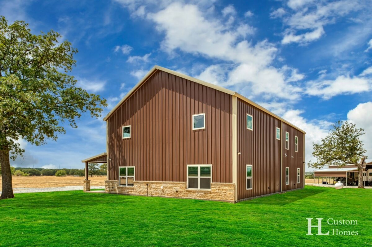 Barndominium with Exposed Foam Living Room by HL Custom Homes ...